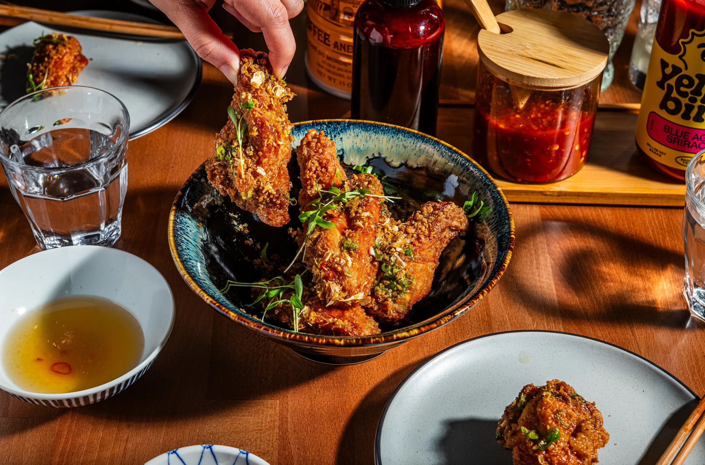 Crispy fried wings with caramelized fish sauce and garlic.