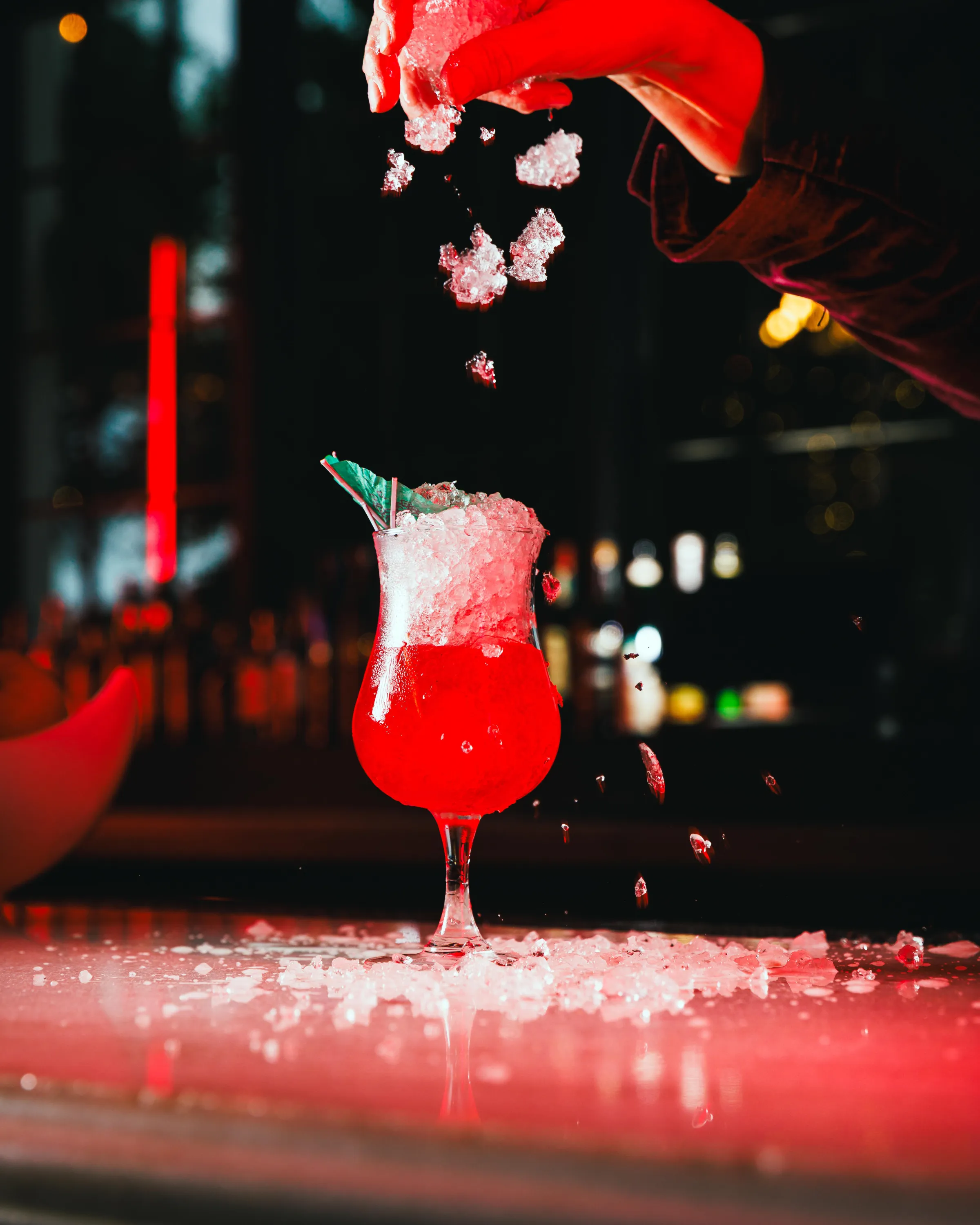 NOLA-loving cocktails showcase crushed ice and umbrella garnishes.