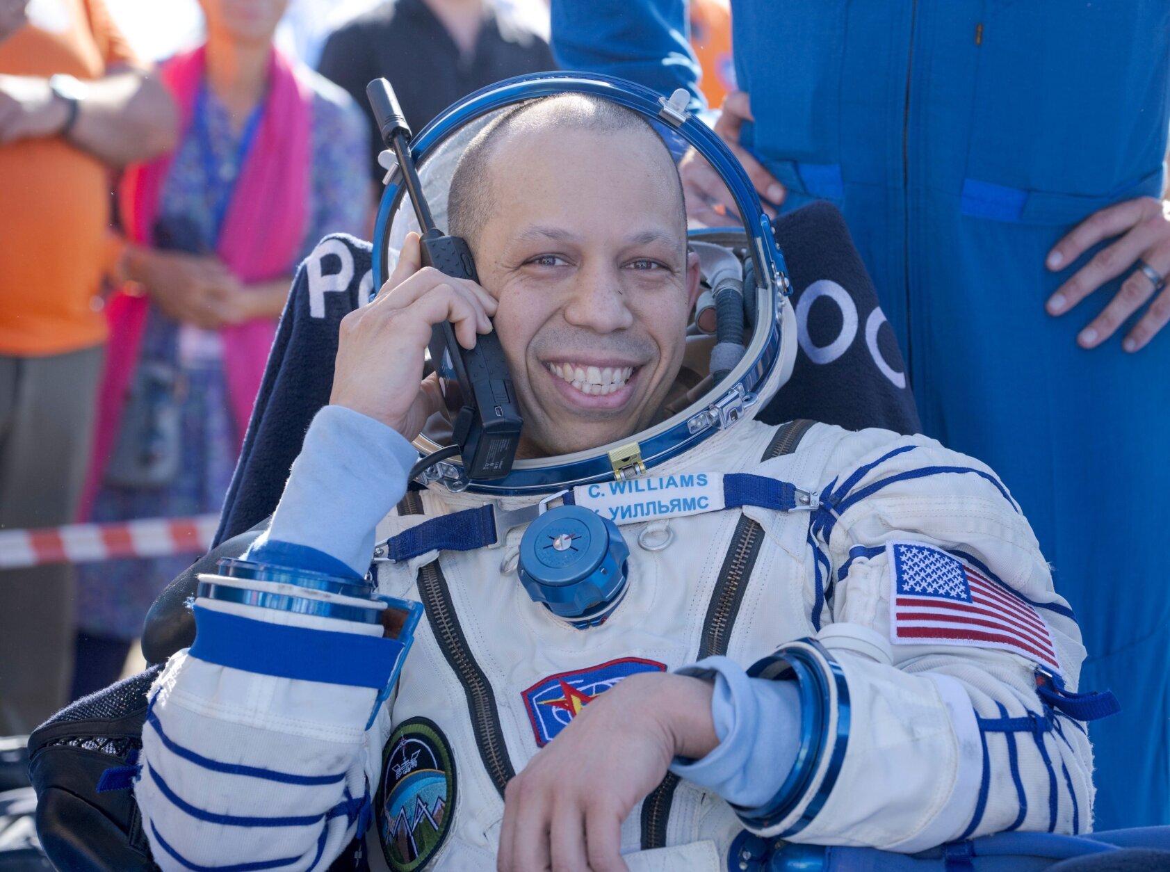 NASA astronaut Chris Williams is seen outside the Soyuz MS-28 spacecraft after he landed with Expedition 74 Roscosmos cosmonauts Sergey Kud-Sverchkov, and Sergei Mikaev in a remote area near the town of Zhezkazgan, Kazakhstan on Sunday, July 26, 2026. (Bill Ingalls/NASA via AP)