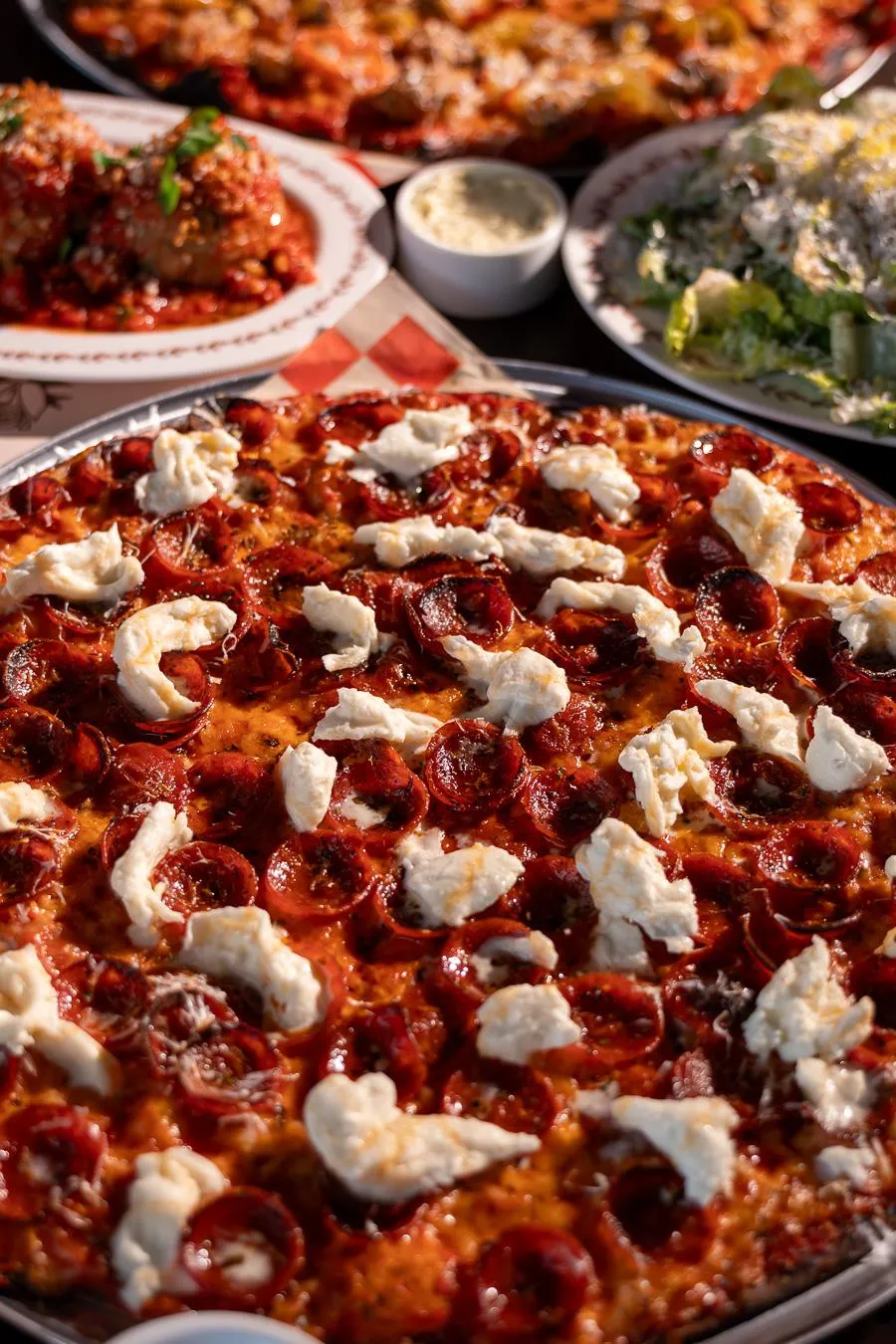 The pepperoni and straciatella pie.