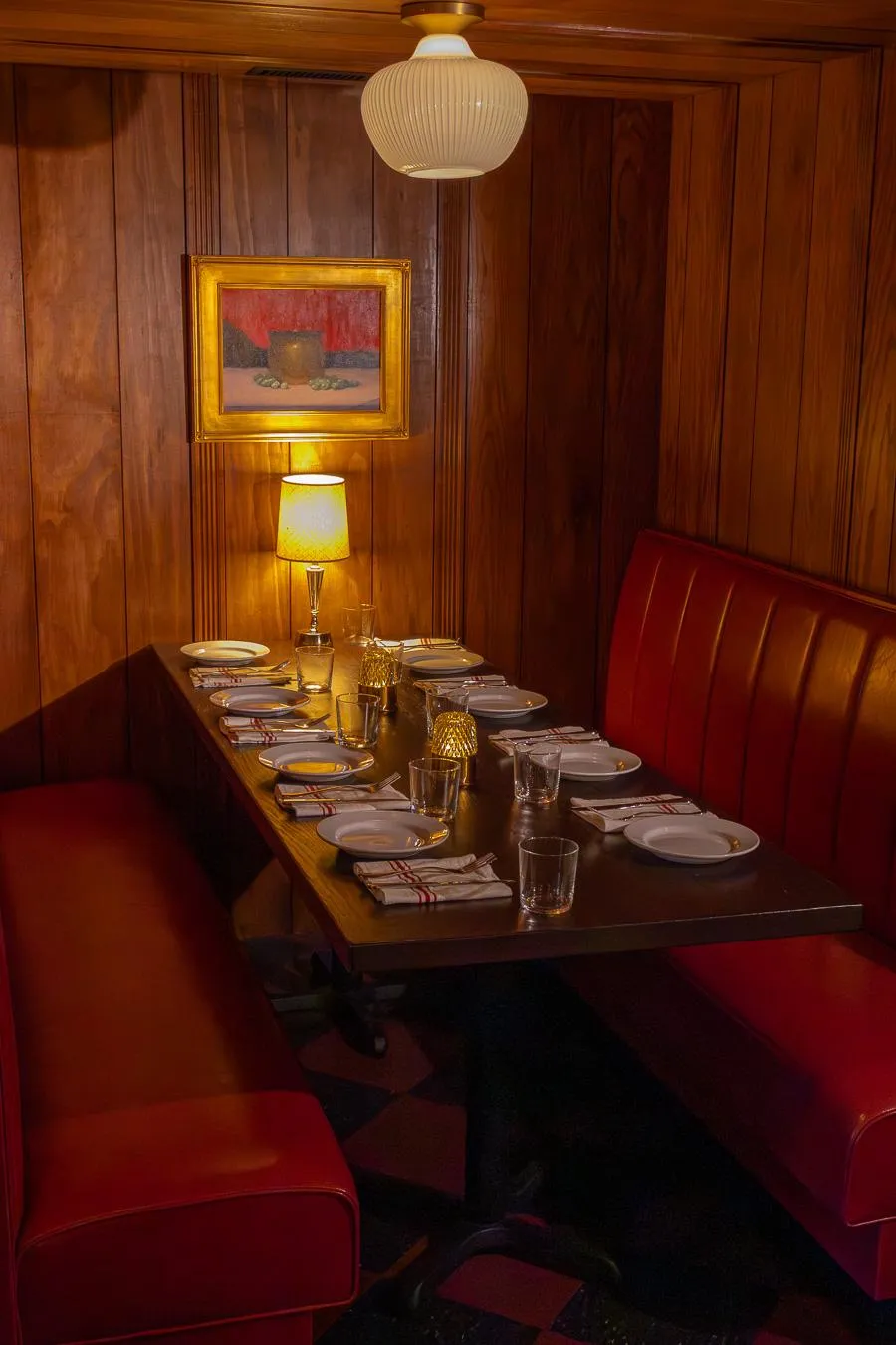 One of the long red booths at La Merna.